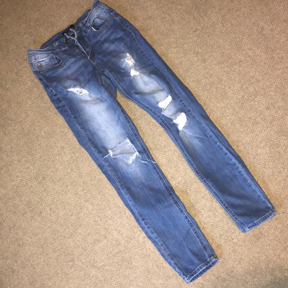 Distressed ripped jeans